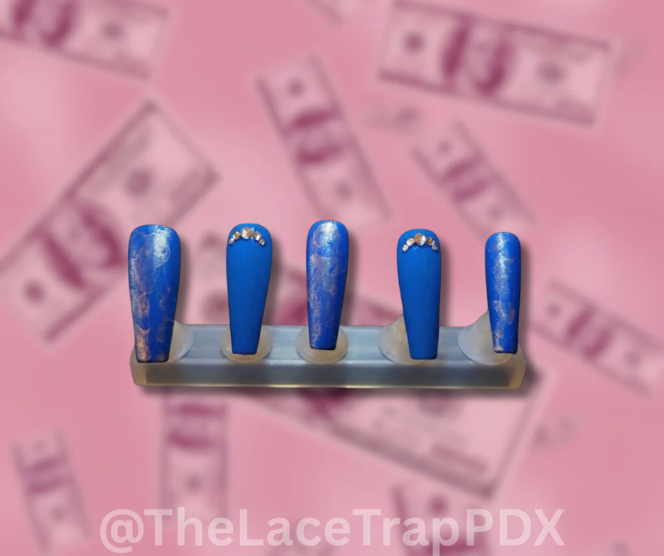 Set of blue nail samples on a pink background with 'The Lace Trap PDX' branding.